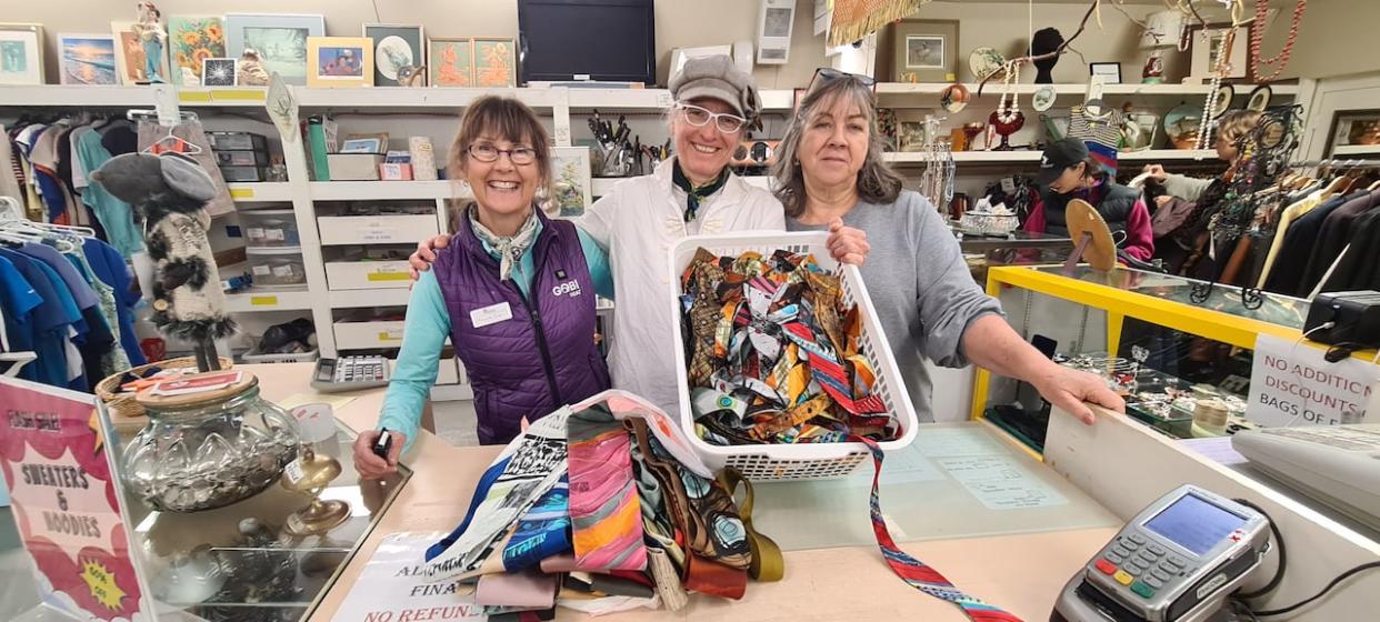 Gabriele Beyer, middle, is thrilled to have recovered some of the hundreds of pieces of artwork stolen from her home in Osooyos, B.C., in 2021. (Submitted by Gabriele Beyer - image credit)