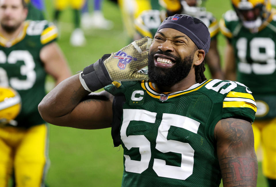 GREEN BAY, WISCONSIN - JANUARY 16: Za'Darius Smith #55 of the Green Bay Packers celebrates defeating the Los Angeles Rams 32-18 in the NFC Divisional Playoff game at Lambeau Field on January 16, 2021 in Green Bay, Wisconsin. (Photo by Stacy Revere/Getty Images)