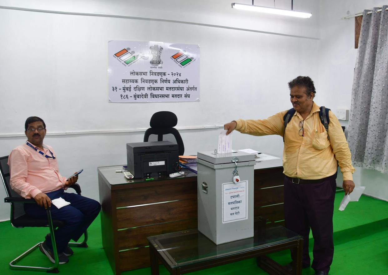 Election duty staff cast their votes through a postal ballot at Municipal School Mumbai Central, 31-Mumbai South Lok Sabha Constituency, ahead of the LokSabha Election, at Mumbai Central on May 13, 2024, in Mumbai, India.
