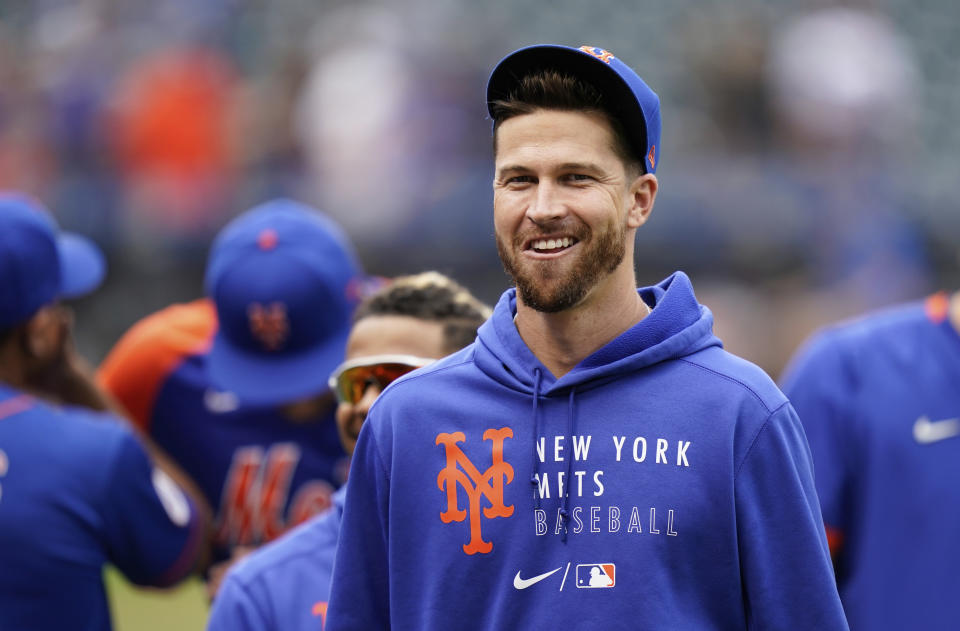 FILE - New York Mets pitcher Jacob DeGrom smiles after the team's baseball game against the Washington Nationals on Aug. 29, 2021, in New York. In his first start since last summer, the two-time Cy Young Award winner fired two innings of one-hit ball in New York's 2-0 victory over the Houston Astros in a preseason game Tuesday, March 22. (AP Photo/Corey Sipkin, File)