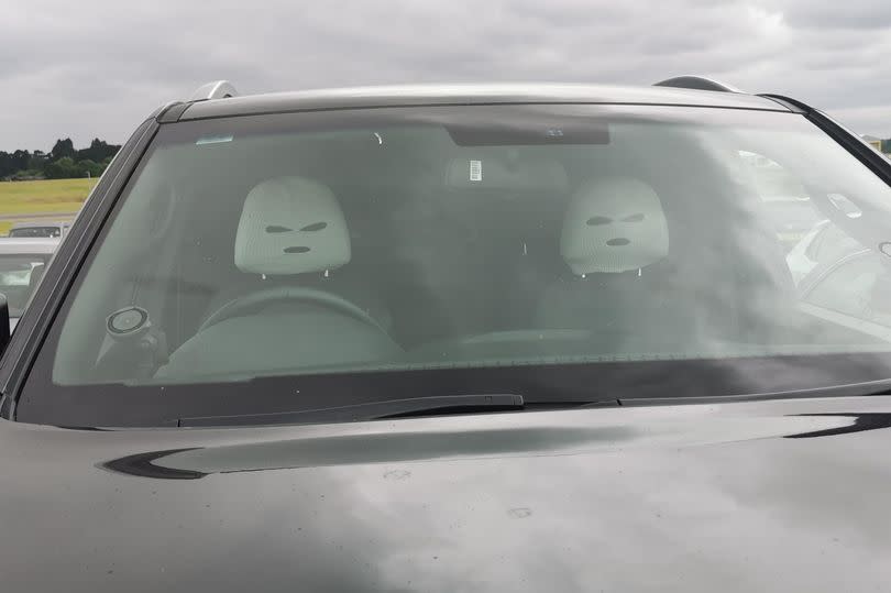 Two seat head covers which resemble white balaclavas that BHX police say they were;'t caught out by this time - unlike covers that resembled people in March