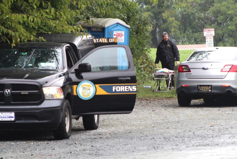New Castle County Police investigate a "suspicious death" after a woman's body was found in a wood line in Carousel Park on Tuesday, Sept. 26, 2023.