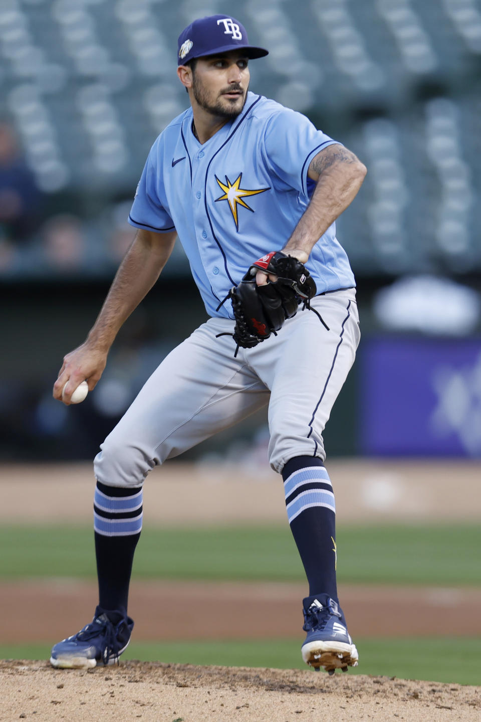 Tampa Bay Rays starting pitcher Zach Eflin throws during the fourth inning of a baseball game against the Oakland Athletics in Oakland, Calif., Monday, June 12, 2023. (AP Photo/Jed Jacobsohn)