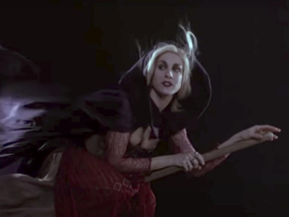 Sarah Jessica Parker rides a broom in "Hocus Pocus."