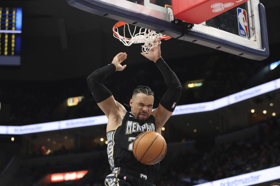 Memphis Grizzlies guard Dillon Brooks dunks against the Detroit Pistons during the first half of an NBA basketball game Friday, Dec. 9, 2022, in Memphis, Tenn. (AP Photo/Nikki Boertman)