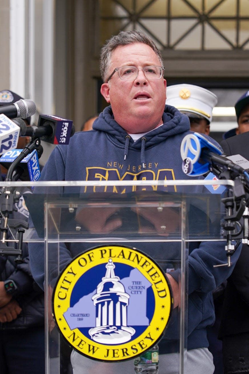 Ed Donnelly, president of the New Jersey State Firefighters Mutual Benevolent Association, speaks at a press conference on the steps outside City Hall after city firefighter Marques Hudson died battling a blaze Friday morning.