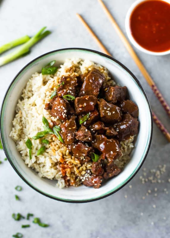 <p>Inquiring Chef</p><p>This tender beef is served in a rich Korean-inspired sweet and savory sauce. Cook brown rice at the same time—all in the pressure cooker or Instant Pot!</p><p><strong>Get the recipe: <a href="https://inquiringchef.com/instant-pot-korean-beef-and-brown-rice/" rel="nofollow noopener" target="_blank" data-ylk="slk:Instant Pot Korean Beef and Brown Rice;elm:context_link;itc:0;sec:content-canvas" class="link rapid-noclick-resp">Instant Pot Korean Beef and Brown Rice</a></strong></p>