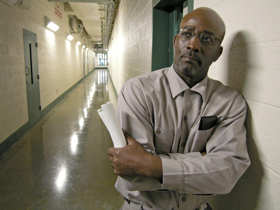 Ronnie Long stands in a hallway at the Albemarle Correctional Institution east of Charlotte, N.C. (Peter Weinberger / The Charlotte Observer via AP file)