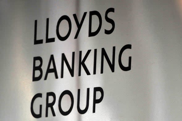 File photo dated 04/08/10 of a sign for Lloyds Banking Group, who will today pledged that 40% of its top 5,000 jobs will be occupied by women within six years. PRESS ASSOCIATION Photo. Issue date: Monday February 3, 2014. The planned increase from the current level of 28% is among a series of commitments being made by chief executive Antonio Horta-Osorio. They also include a pledge to boost net lending to small and medium-sized business by more than ?1 billion this year and the support of more than 80,000 first-time buyers, up from last year's target of 60,000. See PA story CITY Lloyds. Photo credit should read: John Stillwell/PA Wire