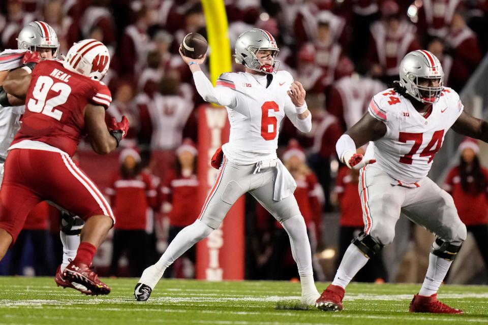 Oct 28, 2023; Madison, Wisconsin, USA; Ohio State Buckeyes quarterback Kyle McCord (6) throws a pass during the NCAA football game against the Wisconsin Badgers at Camp Randall Stadium. Ohio State won 24-10.