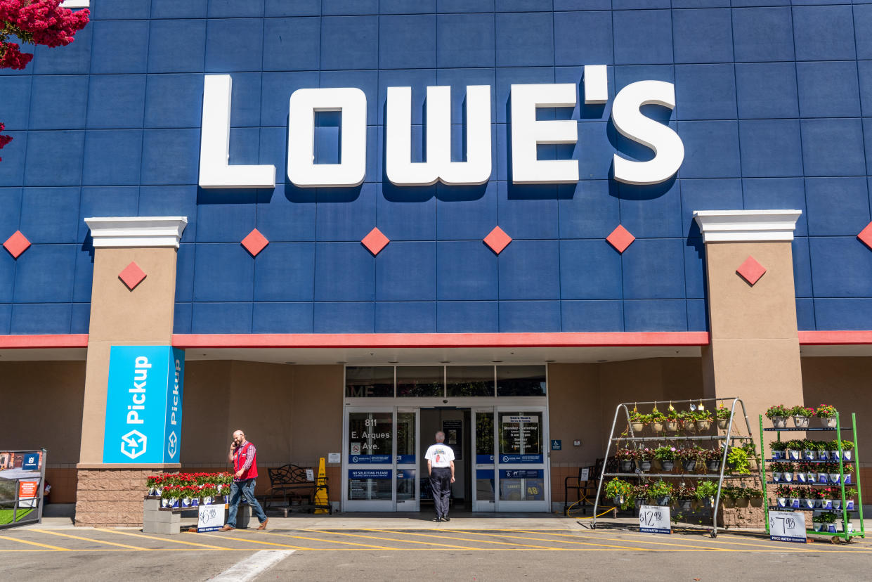 People shop at Lowe's in the South San Francisco bay area. (Getty Images)