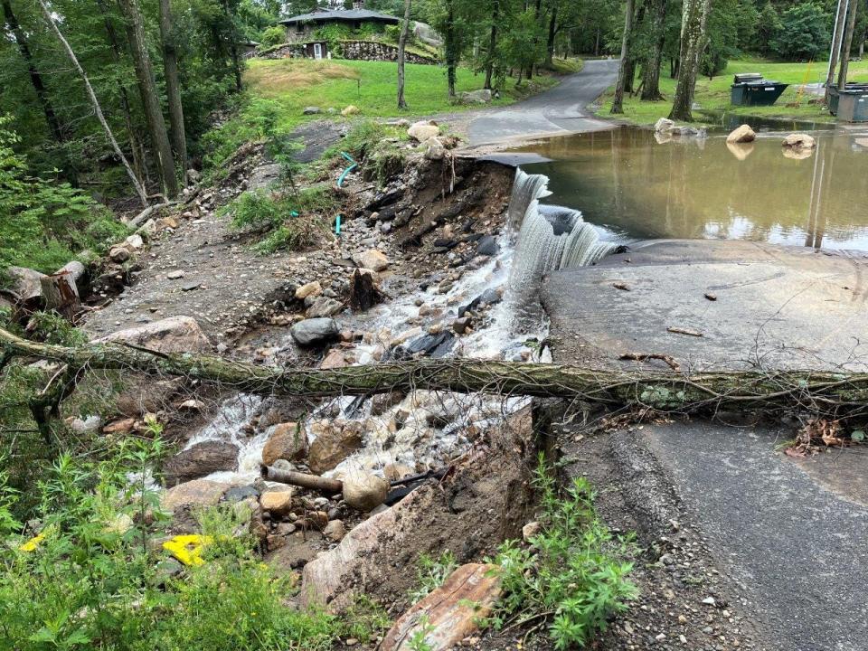 Storm damage from July shown at Bear Mountain State Park on WPA Way looking south towards Bear Mtn South Entrance Road along Dunderberg Playfield on the right.