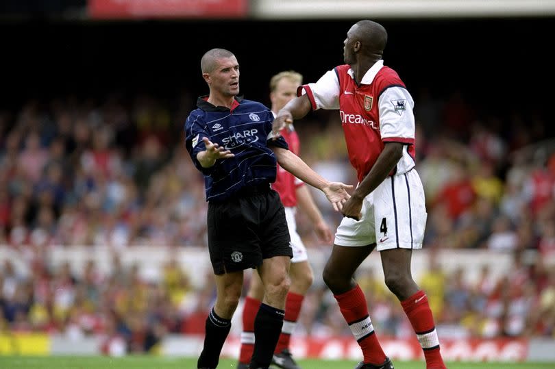 Roy Keane of Manchester United clashes with Patrick Vieira of Arsenal during the Premiership match against Arsenal at Highbury in London, England.