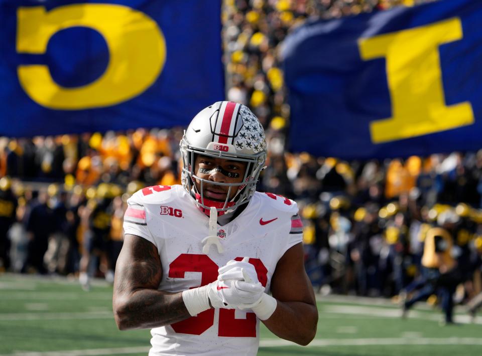 Nov. 25, 2023; Ann Arbor, Mi., USA;
Ohio State Buckeyes running back TreVeyon Henderson (32) take the field before Saturday's NCAA Division I football game against the Michigan Wolverines at Michigan Stadium.