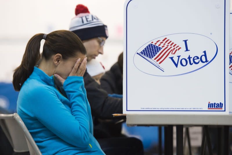 Voters fill out their ballots at Mt. Vernon Center in Alexandria, Va., on November 8, 2016. On January 23, 1845, the U.S. Congress decided that all national elections would take place on the Tuesday following the first Monday in November. File Photo by Molly Riley/UPI