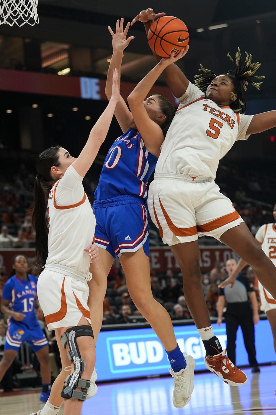 Texas forward DeYona Gaston, right, steals the ball from Kansas' Ioanna Chatzileonti during their Jan. 10 game at Moody Center. Gaston is leading the team in scoring but also is contributing 5.1 rebounds a game.