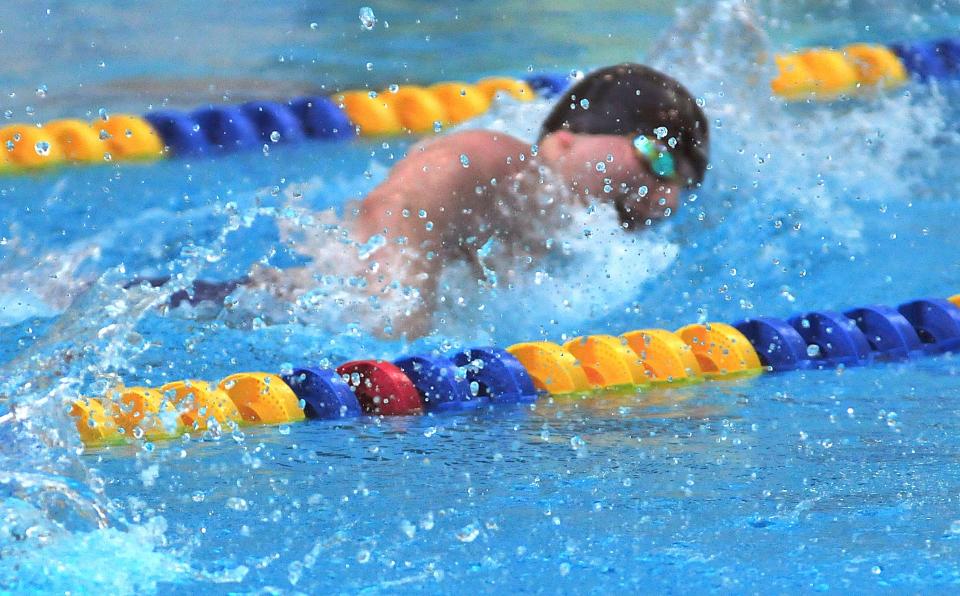 Ashland High School’s Bailey Parsons competes in the 200-yard freestyle during the Ohio Cardinal Conference Championships at Wooster High School Saturday, Jan. 15, 2022.