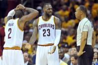 May 4, 2016; Cleveland, OH, USA; Cleveland Cavaliers forward LeBron James (23) disputes a foul call to referee Rodney Mott (71) during the second quarter in game two of the second round of the NBA Playoffs at Quicken Loans Arena. Mandatory Credit: Ken Blaze-USA TODAY Sports