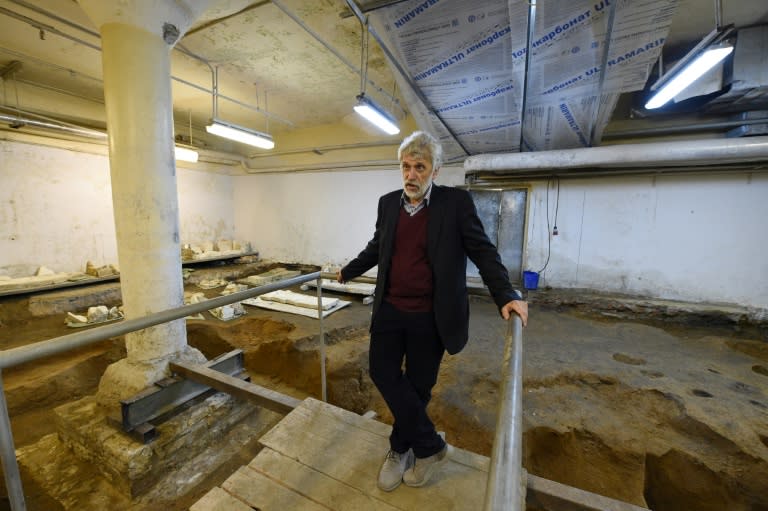 Director of the Institute of Archaeology Nikolai Makarov speaks at an excavation site in Moscow's Kremlin