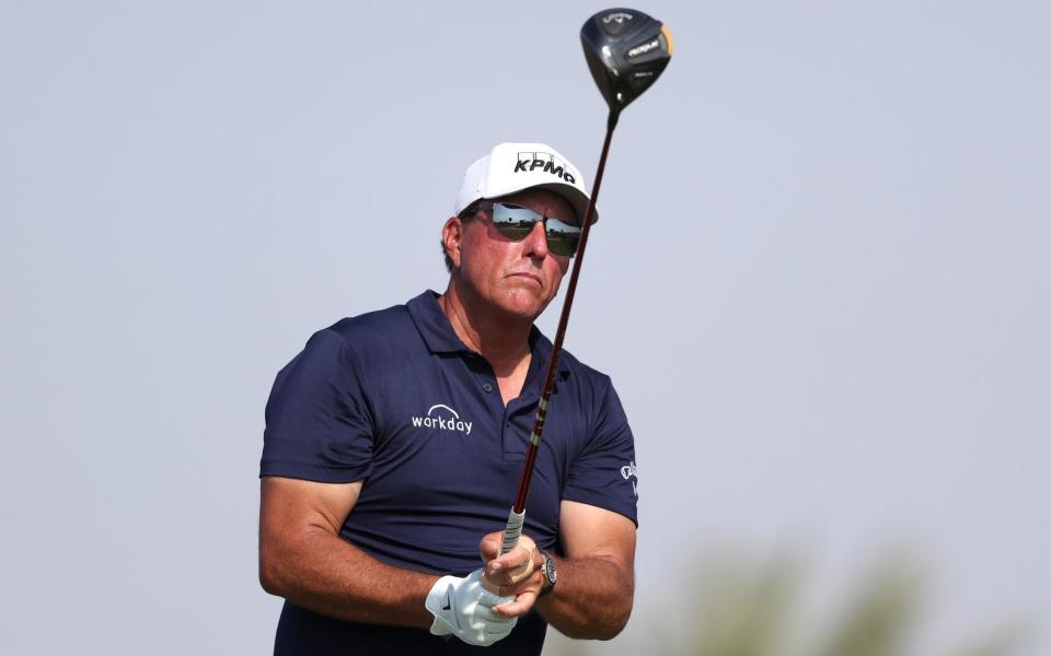 Phil Mickelson of the United States tees off on the 14th hole during day one of the PIF Saudi International at Royal Greens Golf & Country Club on February 3, 2022 in Al Murooj, Saudi Arabia. - GETTY IMAGES