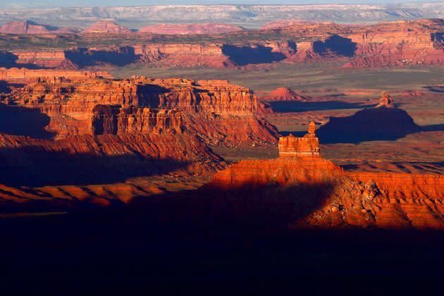 The sun sets over Valley of the Gods in Bears Ears National Monument. So pretty.