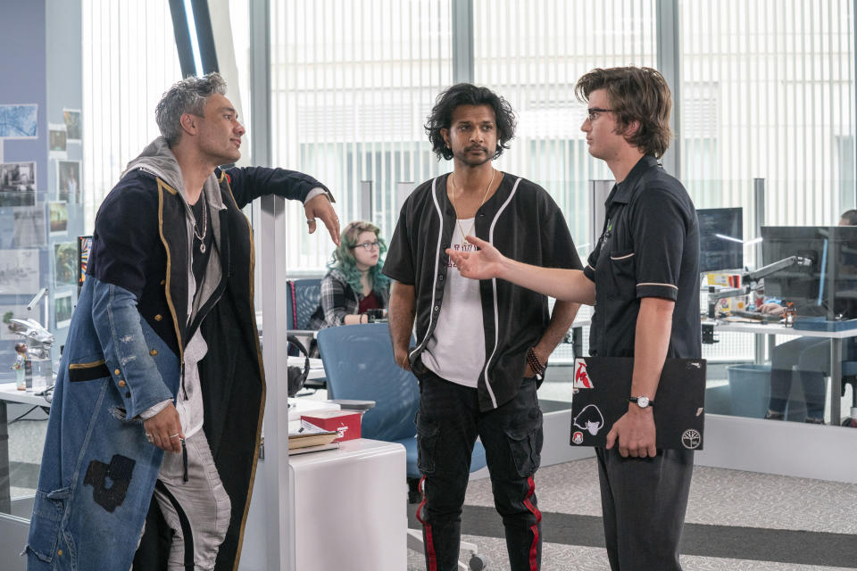 This image released by 20th Century Studios shows Taika Waititi, from left, Utkarsh Ambudkar and Joe Keery in a scene from "Free Guy." (Alan Markfield/20th Century Studios via AP)