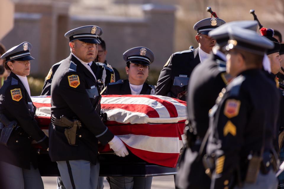 Pallbearers carry the coffin of the late El Paso police chief Greg Allen at Evergreen Cemetery East El Paso on Friday, Jan, 27, 2023.