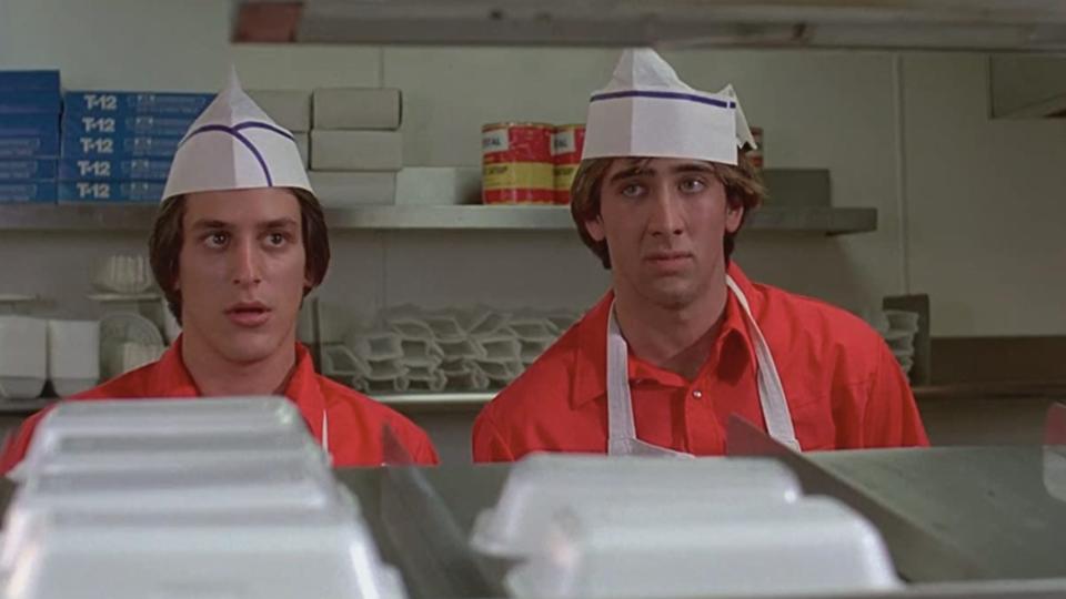 <p> In 1982, Nicolas Cage played ‘Brad’s Bud’ in Amy Heckerling’s directorial debut Fast Times at Ridgemont High (although he’s credited as Nicolas Coppola – he changed the name he shares with his legendary director uncle soon after to try to avoid accusations of nepotism). The coming of age comedy-drama follows two teens through their sophomore year of high school. Brad (Judge Reinhold) is the older brother of protagonist Stacy (Jennifer Jason Leigh), and Cage is his nameless ‘bud’. The screenplay was written by Almost Famous director Cameron Crowe. </p>