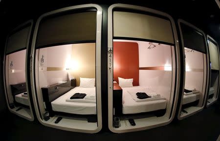 "Business-class" cabins are seen at First Cabin hotel, which was converted from an old office building, in Tokyo, July 3, 2015. REUTERS/Toru Hanai