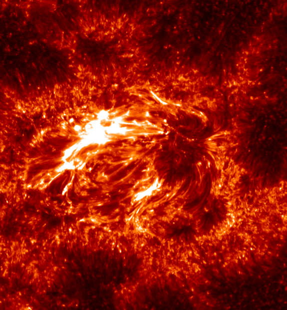 Ultraviolet image of an active region on the sun, showing plasma at temperatures of 140,000 degrees. This image was captured by NASA's IRIS spacecraft on Dec. 6, 2013.