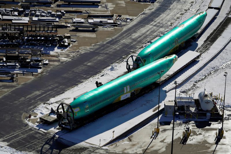 FILE PHOTO: Airplane fuselages bound for Boeing's 737 Max production facility await shipment on rail sidings at their top supplier, Spirit AeroSystems Holdings Inc, in Wichita