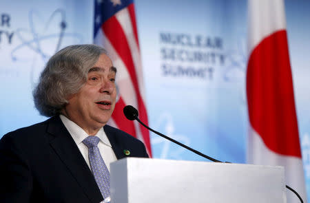 FILE PHOTO - U.S. Secretary of Energy Ernest Moniz and Japan's Deputy Chief Cabinet Secretary Koichi Hagiuda (not pictured) hold a joint press statement at the Nuclear Security Summit in Washington April 1, 2016. REUTERS/Gary Cameron/File Photo