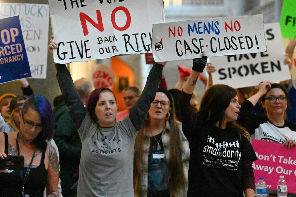 Protesters outside the Kentucky Supreme Court chambers rally in favor of abortion rights as the Kentucky Supreme Court hears arguments whether to temporarily pause the state's abortion ban in Frankfort, Ky., Tuesday, Nov. 15, 2022. (AP Photo/Timothy D. Easley)