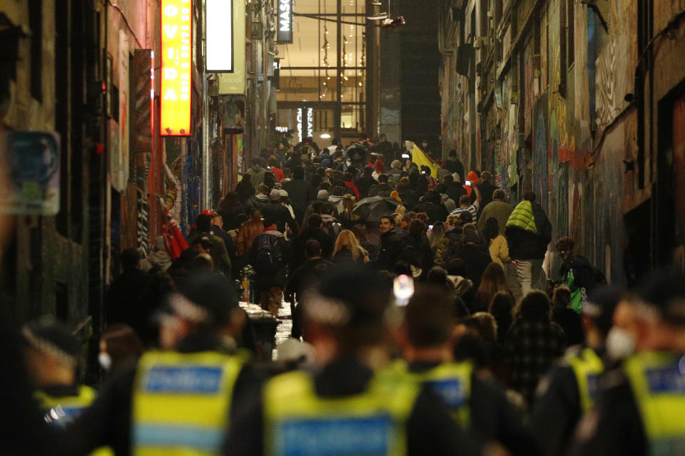 Protesters march up Melbourne's famous Hosier Lane. Source: AAP