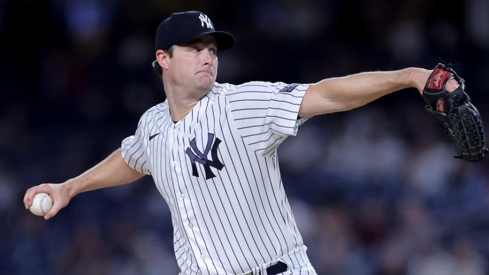 New York Yankees starting pitcher Gerrit Cole (45) pitches against the Toronto Blue Jays during the first inning at Yankee Stadium.