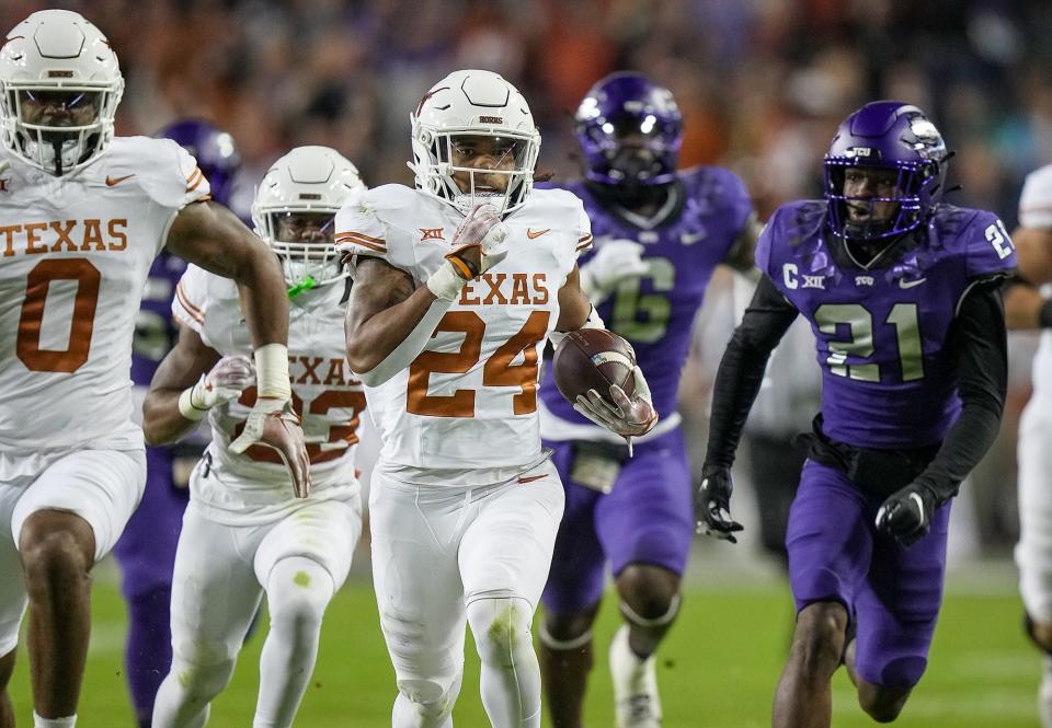 Nov 11, 2023; Fort Worth, Texas, USA; Texas Longhorns running back Jonathon Brooks (24) runs for the first down against TCU Horned Frogs in the first quarter of an NCAA college football game at Amon G. Carter Stadium. Mandatory Credit: Ricardo B. Brazziell-USA TODAY Sports