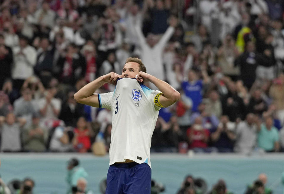 England's Harry Kane reacts after he missed a penalty kick during the World Cup quarterfinal soccer match between England and France, at the Al Bayt Stadium in Al Khor, Qatar, Saturday, Dec. 10, 2022. (AP Photo/Frank Augstein)