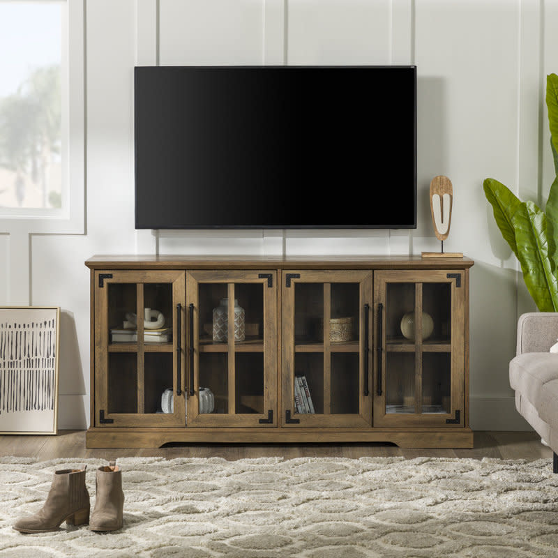 <p><a href="https://go.redirectingat.com?id=74968X1596630&url=https%3A%2F%2Fwww.wayfair.com%2F--%2Fpdp%2Fgracie-oaks--dougan-tv-stand-for-tvs-up-to-65-x117814275-l6-w006703164.html&sref=https%3A%2F%2Fwww.countryliving.com%2Fshopping%2Fg46243210%2Fwayfair-end-of-year-sale-2023%2F" rel="nofollow noopener" target="_blank" data-ylk="slk:Shop Now;elm:context_link;itc:0;sec:content-canvas" class="link ">Shop Now</a></p><p>Dougan TV Stand</p><p>wayfair.com</p><p>$309.99</p>