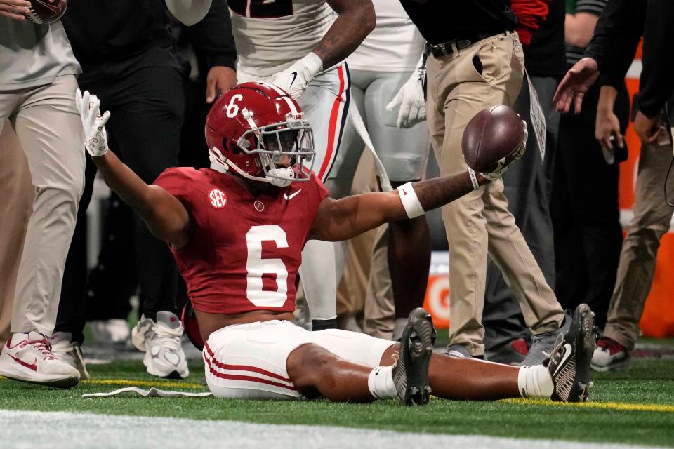 The next great Alabama wide receiver? After Isaiah Bond's transfer to Texas, the Crimson Tide hope Kobe Prentice, shown celebrating a catch against Georgia in the SEC championship game, steps up into that role.