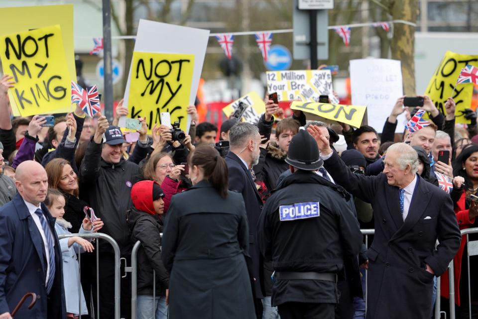 King Charles greets a crowd and protesters at Church of Christ the Cornerstone ahead of a reception in Milton Keynes on February 16, 2023.