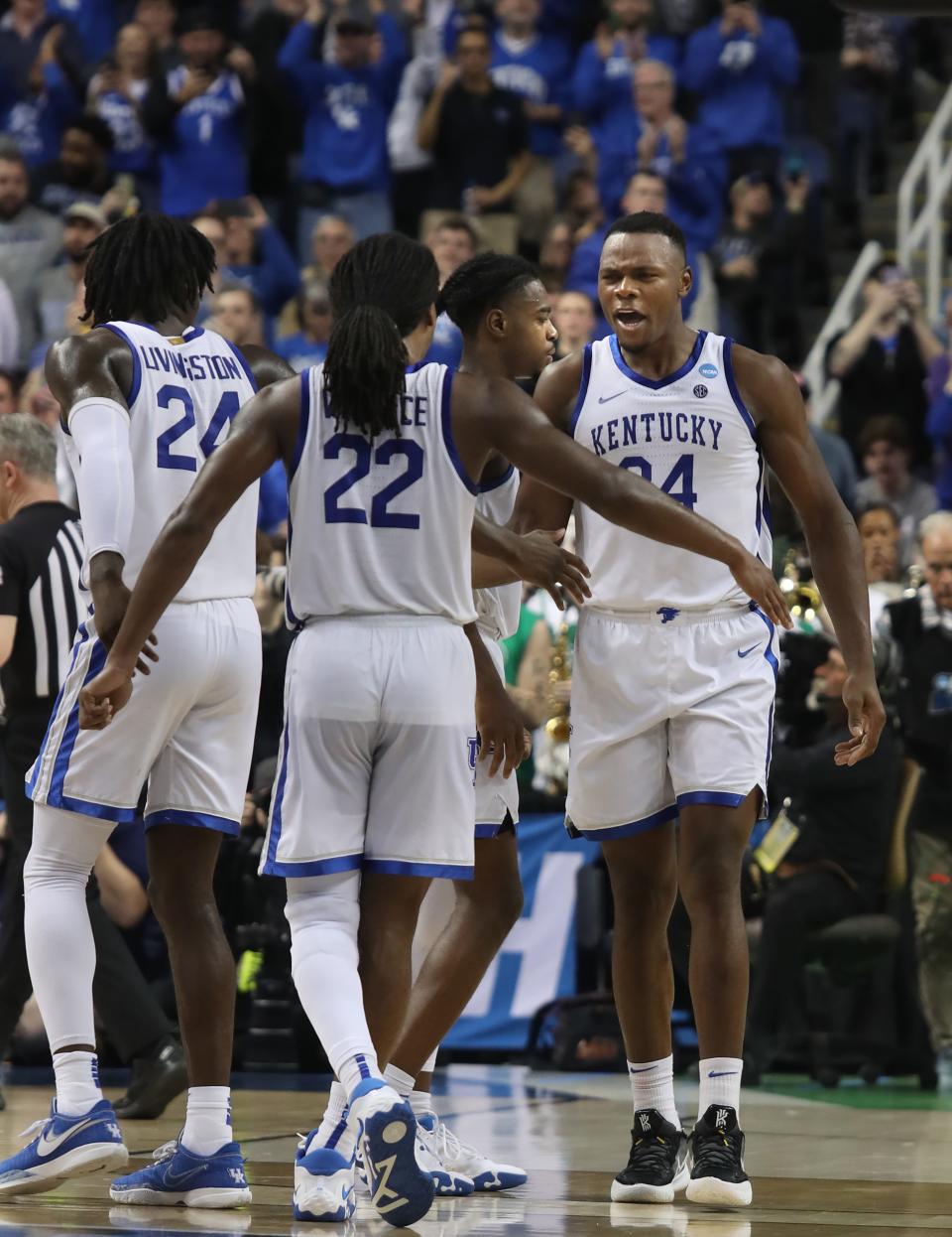 Kentucky’s Oscar Tshiebwe congratulates Cason Wallace  before they walk off the court after beating Providence in the NCAA Tournament. March 17, 2023