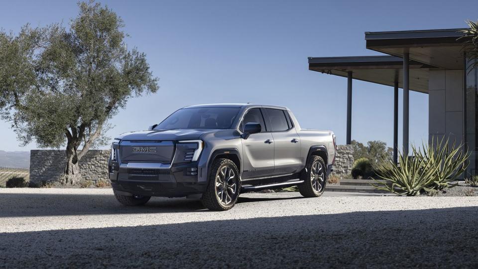 the first ever gmc sierra ev denali edition 1 from a front 34 view