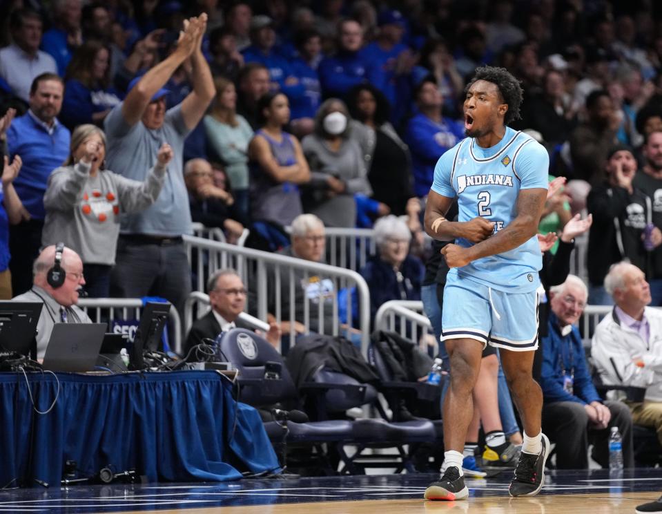 Indiana State Sycamores guard Isaiah Swope (2) yells in excitement Thursday, April 4, 2024, during the NIT championship game at Hinkle Fieldhouse in Indianapolis. The Seton Hall Pirates defeated the Indiana State Sycamores, 79-77.