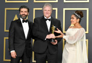 Sound engineer Donald Sylvester, winner of the Sound Editing award for “Ford v Ferrari,” poses with Oscar Isaac and Salma Hayek in the press room during the 92nd Annual Academy Awards at Hollywood and Highland on February 09, 2020 in Hollywood, California. (Photo by Amy Sussman/Getty Images)