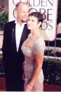 <p>You know it’s been a long time when you see Bruce Willis with hair on his head. Meanwhile, Demi Moore looked like a silver siren in this beaded gown. </p>