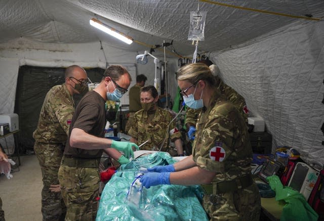 Medical staff from the military services during a test of the Army Medical Service’s Mytchett based 22 Field Hospital, at Barton Stacey in Hampshire