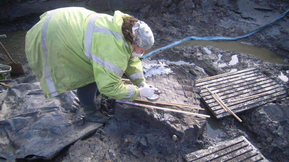 A woven basket, thought to have contained bread, was found alongside the eggs. - Oxford Archaeology