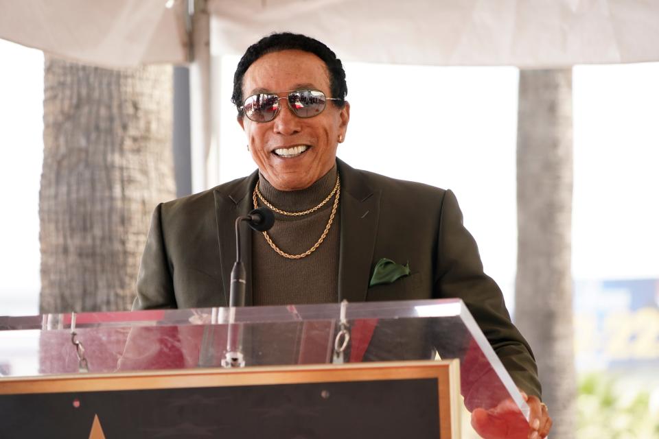 Smokey Robinson speaks during a ceremony honoring Martha Reeves, right, with the 2,776th star on the Hollywood Walk of Fame on March 27, 2024, in Los Angeles.