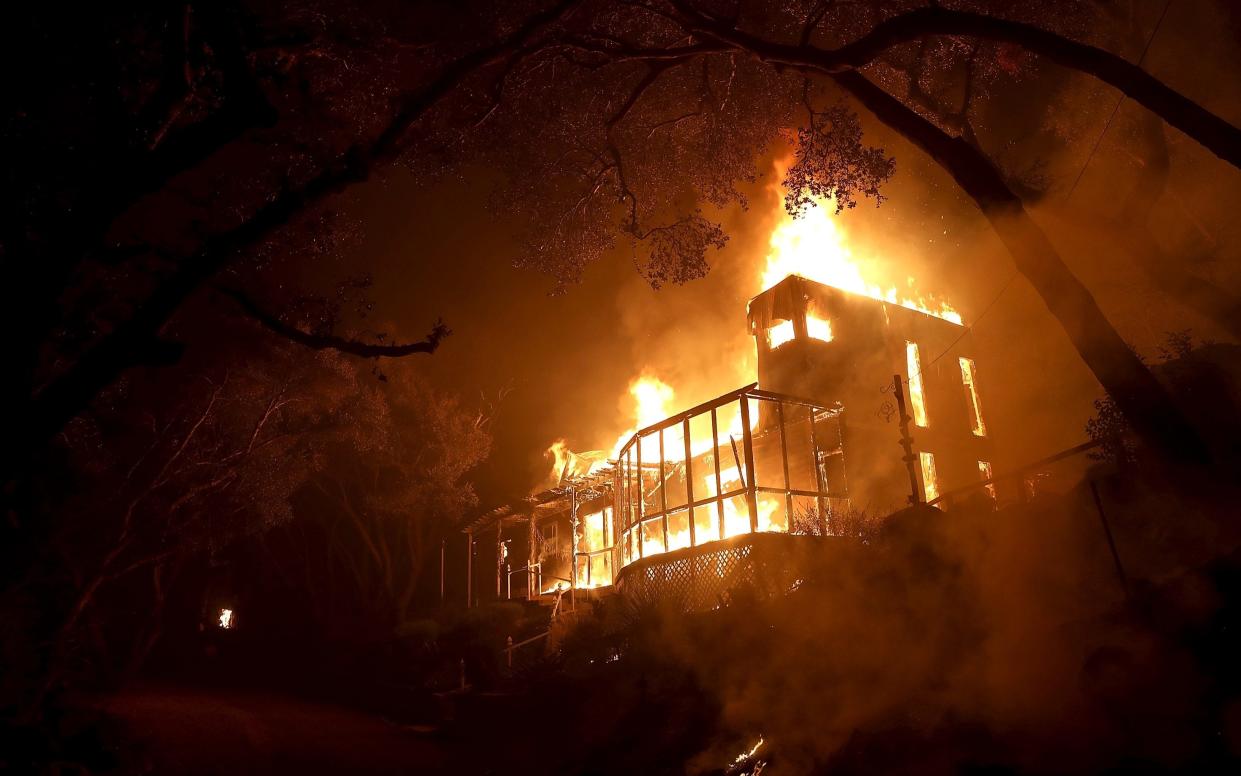 A home is consumed by fire - 2017 Getty Images