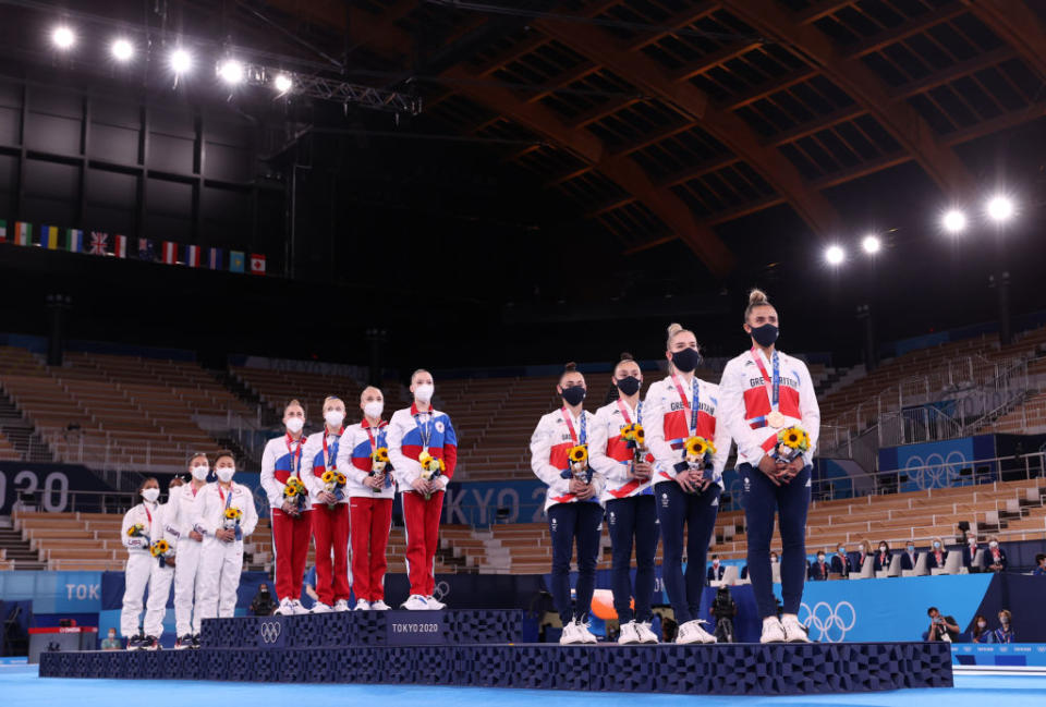 Team USA with Silver, Team ROC with Gold and Great Britain with Bronze during the medal ceremony in the Women's Team Final on day four of the Tokyo 2020 Olympic Games at Ariake Gymnastics Centre on July 27, 2021 in Tokyo, Japan.<span class="copyright">Laurence Griffiths—Getty Images</span>